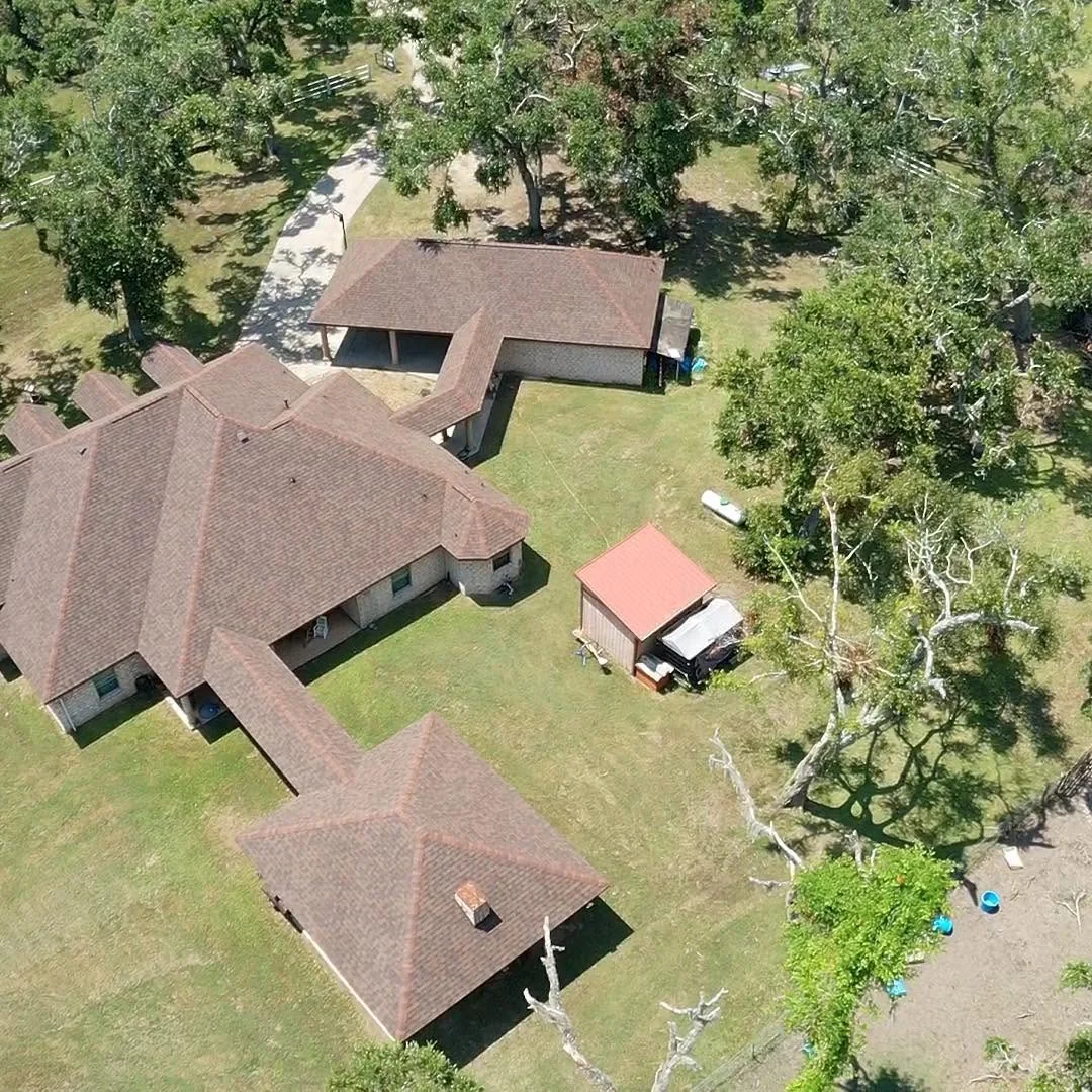 Completed residential roof viewed from above